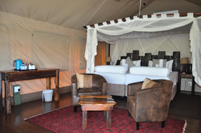 Kavango River lodge – luxury tent bedroom and sitting area