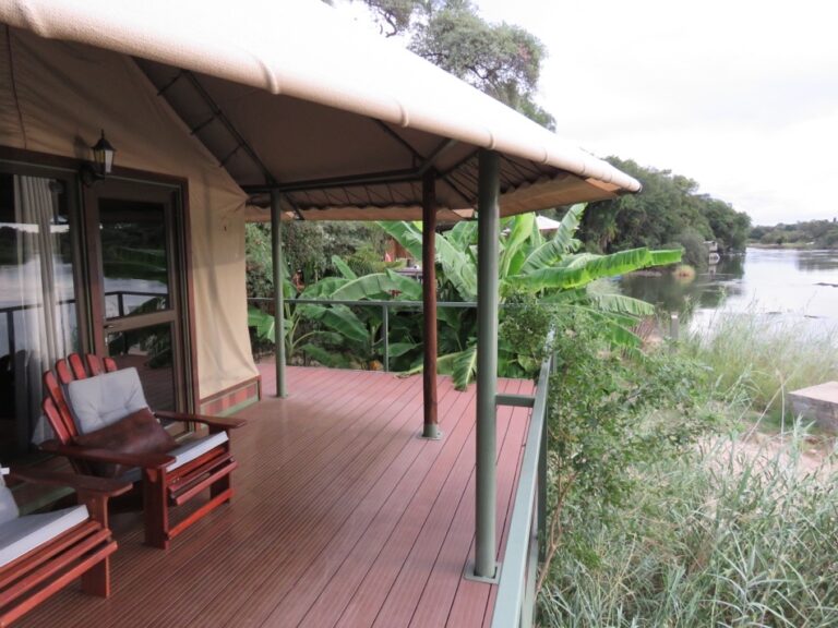 Divundu river lodge – private deck outside a riverside tent