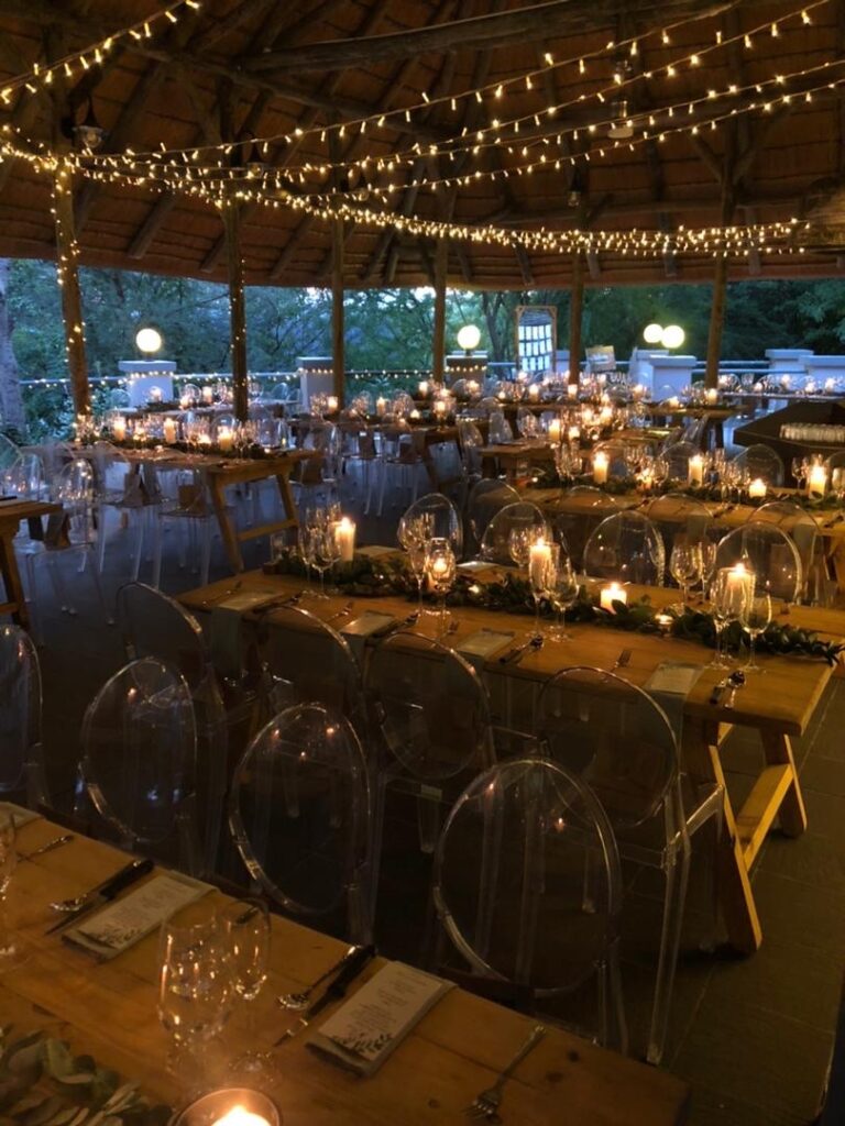 Divundu river lodge – candlelit dining tables under thatch