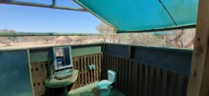 Spitzkoppe Mountain camp – open-air toilet and basin with landscape views