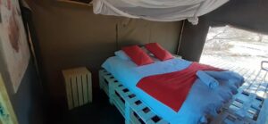 Spitzkoppe accommodation – double bed with mosquito net