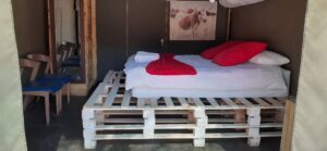 Spitzkoppe Tented Camp – double pallet bed and bedside chair