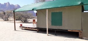Spitzkoppe Mountain camp – side view of a shaded tented room