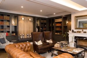 Klein Windhoek accommodation – library lounge with fireplace