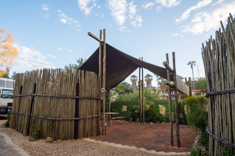 Windhoek glamping – rustic fenced campsite entrance