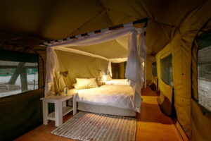 UrbanCamp Windhoek – made-up double bed inside safari tent