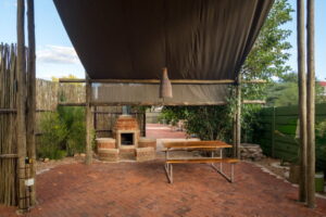 Windhoek glamping – brick barbecue and picnic table