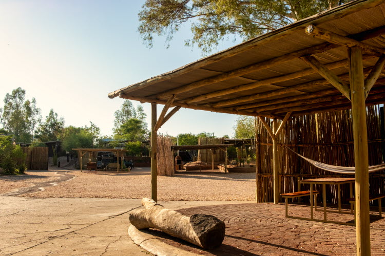UrbanCamp – shaded campsite seating area