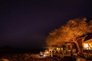 Wolwedans – outdoor dinner beneath dark skies