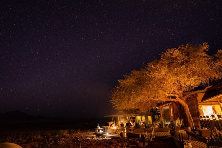 Wolwedans – outdoor dinner beneath dark skies
