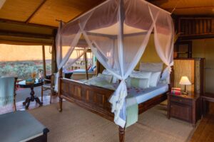 Wolwedans – tented room with canopy bed