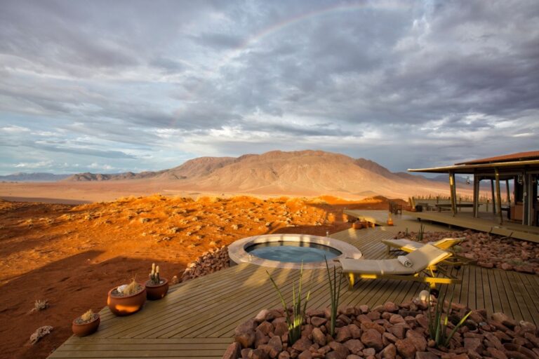 NamibRand accommodation – desert lodge pool and mountain view