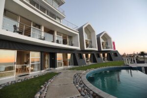 @ The Sea Boutique Guesthouse – modern beachfront façade and infinity pool