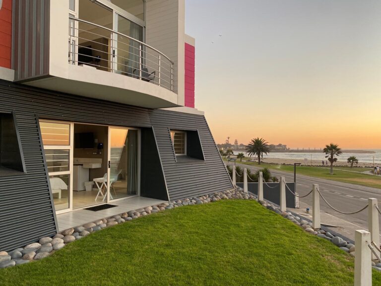 boutique guesthouse in Swakopmund – ground-floor room opening onto a lawn
