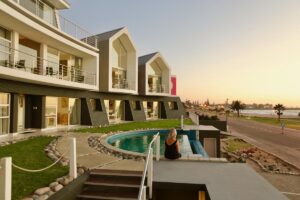 Swakopmund beachfront guesthouse – guesthouse exterior in warm evening light