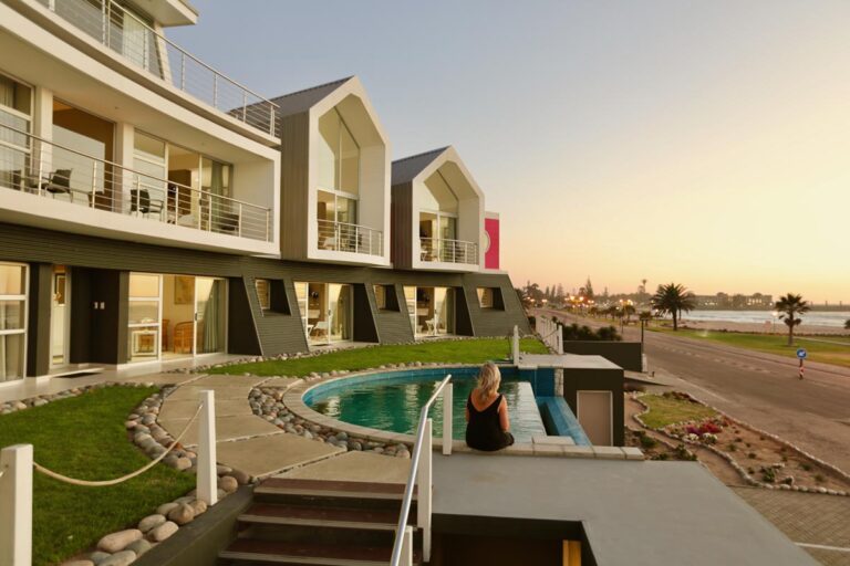 Swakopmund beachfront guesthouse – guesthouse exterior in warm evening light