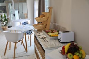 boutique guesthouse in Swakopmund – bright sea-view breakfast table