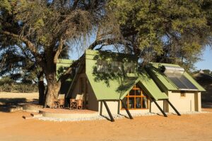 Kalahari camping – private chalet beneath camel-thorn trees