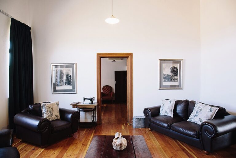 White House Guest Farm – main-house lounge with wooden floors
