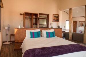 Desert Breeze accommodation – double bed and dresser