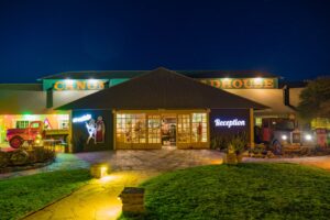 Canyon Roadhouse reception and entrance illuminated at night