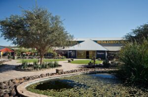 Canyon Roadhouse garden pond and main building