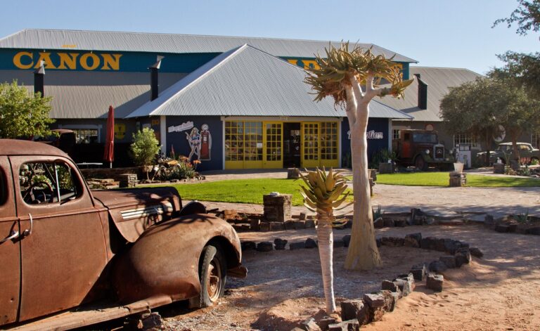 Canyon Roadhouse exterior with historic vehicle display