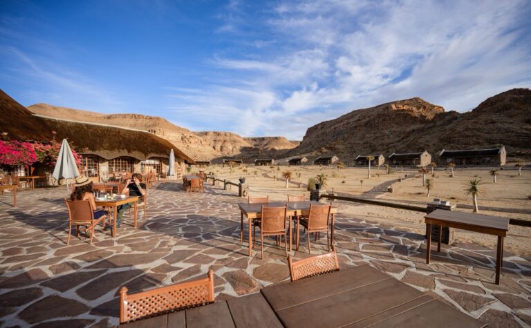 Outdoor terrace seating at Canyon Village accommodation