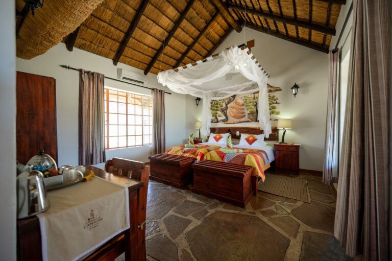 Canopy bed in a Canyon Village guest room