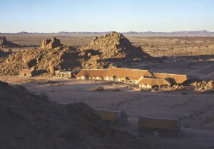 Canyon Village lodge buildings beneath southern Namibia hills