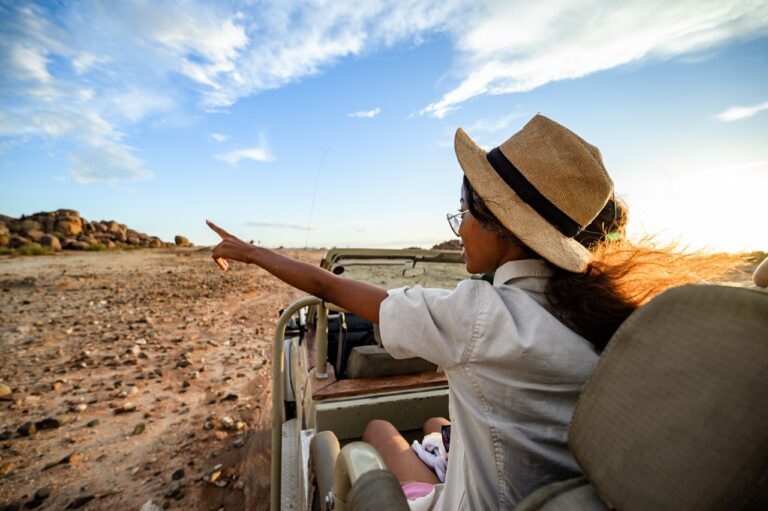 Canyon Village guest viewing the reserve from a safari vehicle