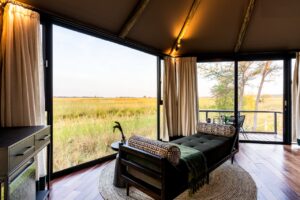 Tented chalet interior at Chobe River Camp overlooking the Chobe floodplains