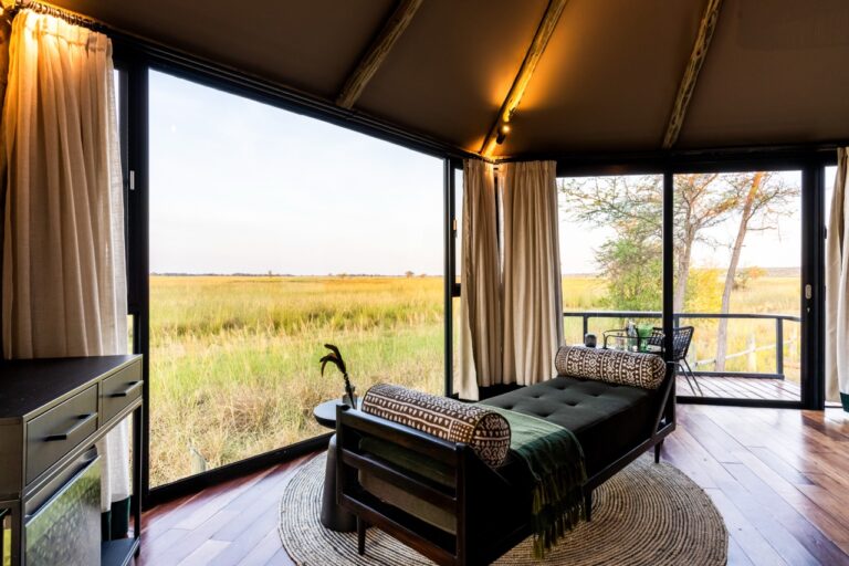 Tented chalet interior at Chobe River Camp overlooking the Chobe floodplains