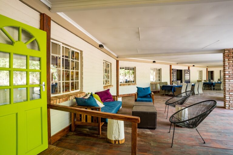 Covered guest lounge at Damara Mopane Lodge accommodation