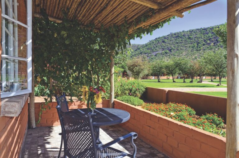 Private garden patio at Damara Mopane Lodge accommodation