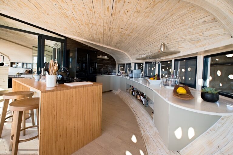 Open kitchen and dining area in Desert Whisper accommodation