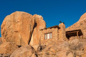 Eagles Nest chalet built beside a granite boulder