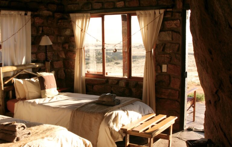 Bright bedroom and veranda in an Eagles Nest chalet