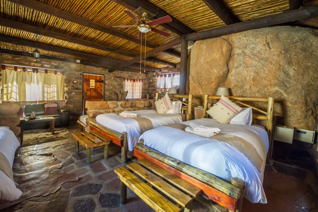 Twin bedroom inside Eagles Nest Chalets accommodation