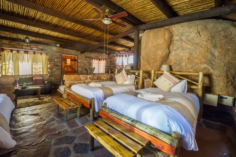 Twin bedroom inside Eagles Nest Chalets accommodation