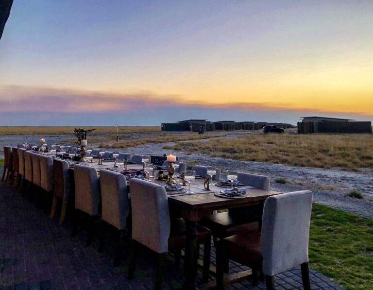 Sunset dinner table overlooking the plains at Etosha King Nehale