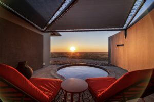 Private plunge pool and sunset view at Etosha King Nehale