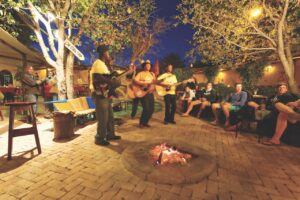 Evening musicians beside the fire at Etosha Safari Camp