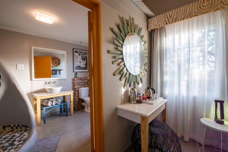 Dressing area beside an Etosha Safari Camp bedroom