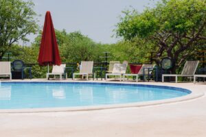 Pool and loungers at family accommodation near Etosha