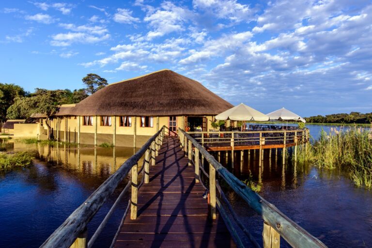 Hakusembe River Lodge deck and thatched restaurant beside the Okavango River