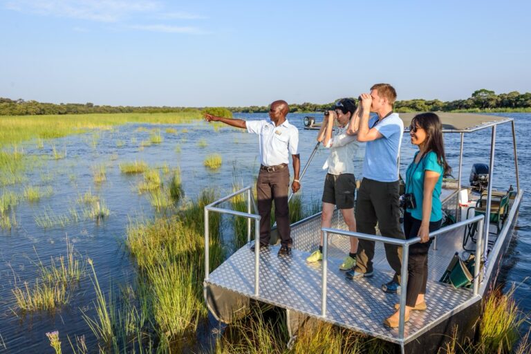 Guests on an Okavango River boat cruise from Hakusembe