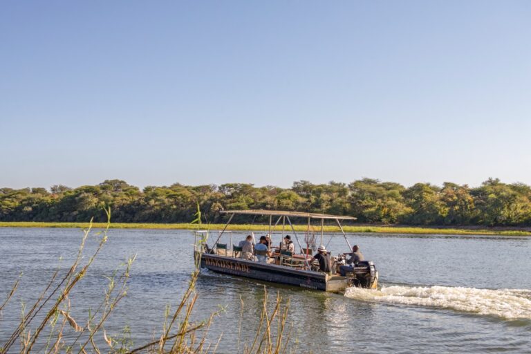 Guests cruising the Okavango River near Hakusembe