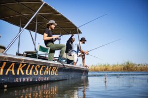 Anglers fishing from a Hakusembe River Lodge boat