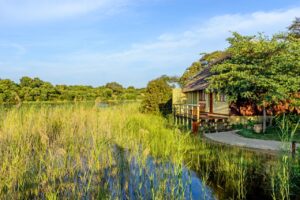 Riverfront chalet beside the Okavango River at Hakusembe River Lodge